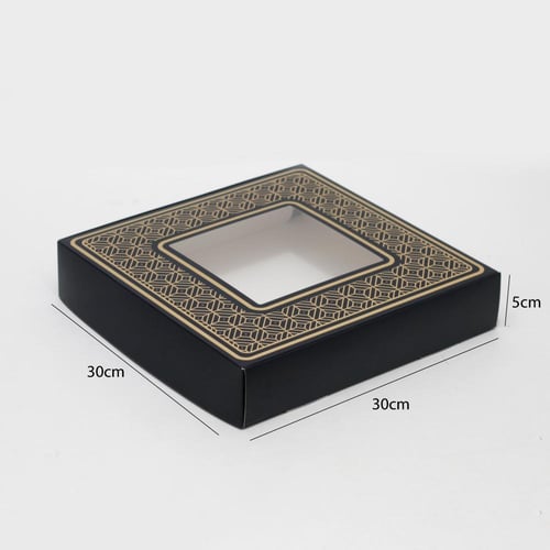 علب ورقية مزخرفة بتصاميم ذهبية