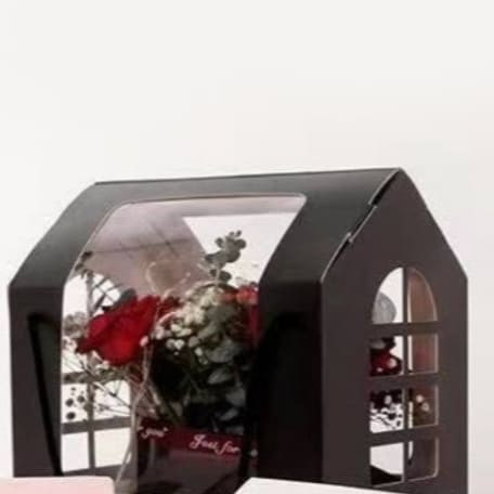 علب هدايا ورقية بشكل منزل