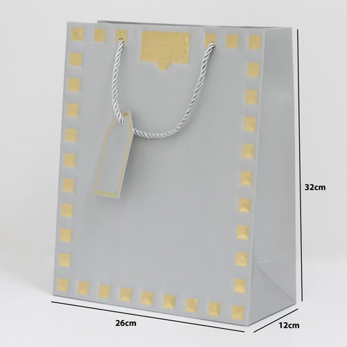 أكياس هدايا مزخرفة بإطار ذهبي