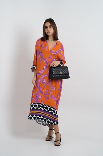 فستان ملمس قطني اورنج و تموجات بالموف طويل 2025