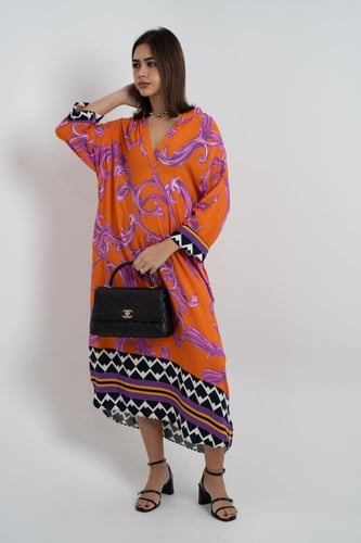 فستان ملمس قطني اورنج و تموجات بالموف طويل 2025