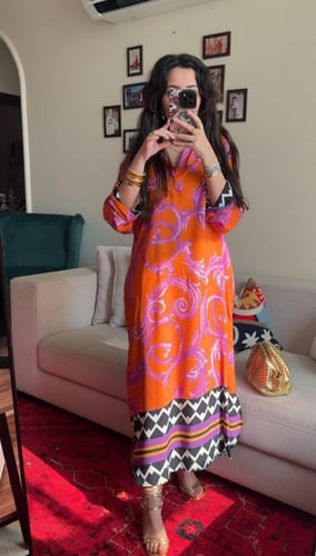 فستان ملمس قطني اورنج و تموجات بالموف طويل 2025