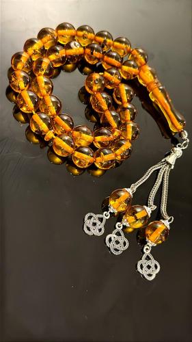 سبحة كبي كهرمان بالحشرات