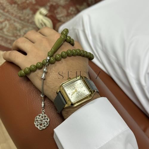 ساعة رجالي ذهبي استيك جلد رصاصي مينا ابيض ارقام عر...