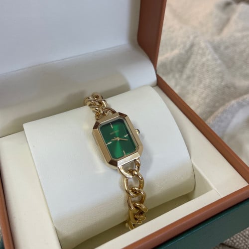 ساعه سلاسل ذهبي وميناء اخضر