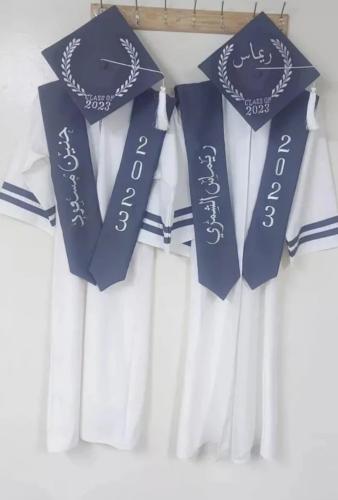 عباية وقبعة ووشاح تخرج