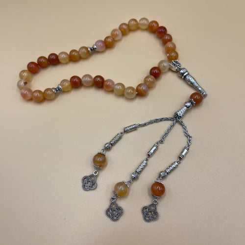 سبحة رجالية عقيق برتقالي مطعم بالابيض