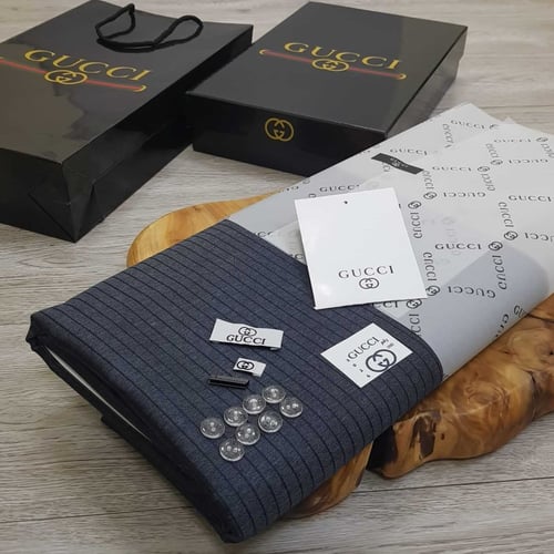 اقمشة قوتشي رجاليه