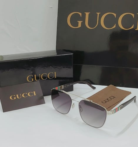 نظارات قوتشي رجالي | تصميم طيار كلاسيكي مع شعار ال...