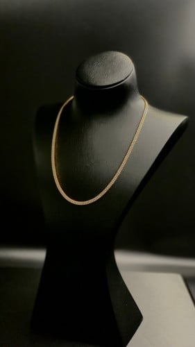 Golden tennis bracelet