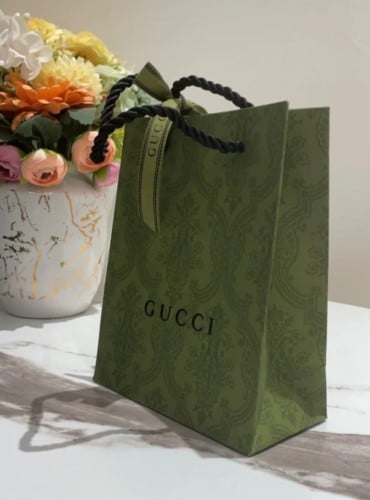 كيس قوتشي مع شريطه