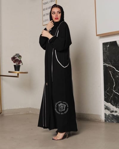 عباية واسعه كسرات مثلث ارجوانة