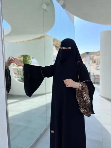 عباية تايقر