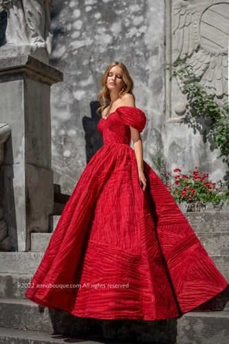 ‏ Off-shoulder gown with Puffy skirt