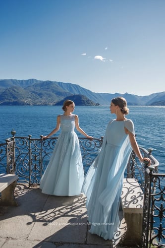 Pale Blue Pleated Dramatic Cape-Sleeve Gown