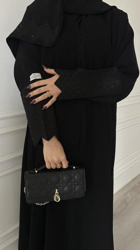 عباية نص كلوش قماش(سراميك)اكمام شك اسود