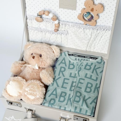 حقيبة جلدية فاخرة بلباس من TED BAKER