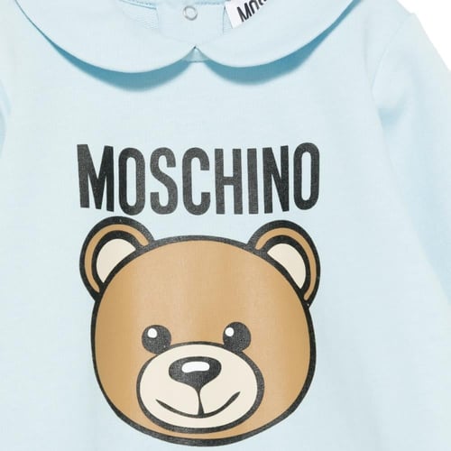 حقيبة جلدية فاخرة بلباس من Moschino