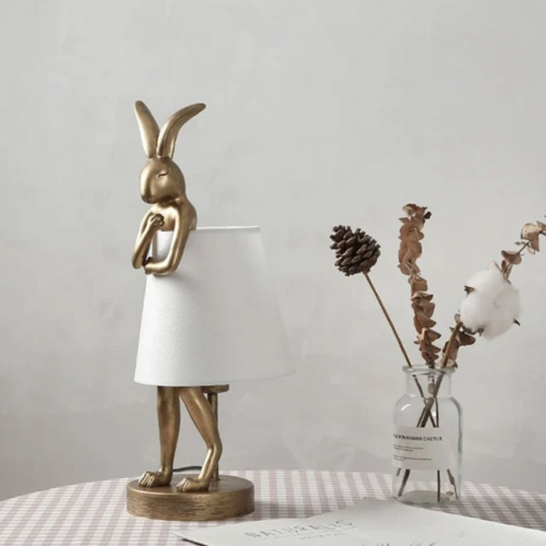 اضاءة ستاند ابجورة تصميم ارنب متكتف لون ذهبي - متو...