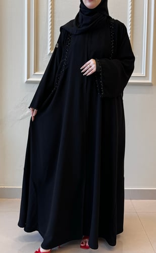 عباية جيوب بشك أسود ناعمة