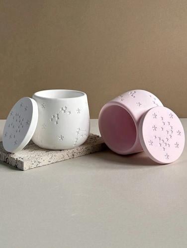 وعاء بغطاء لصب الشموع مصنوع من الجبس