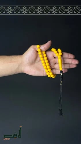 Yellow blazer with black thread and tassel detail