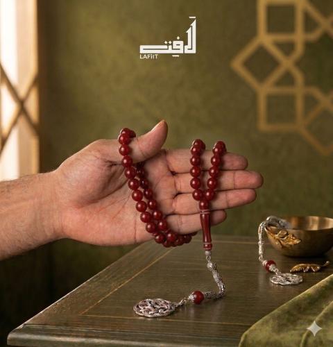 Red rosary with silver tassel