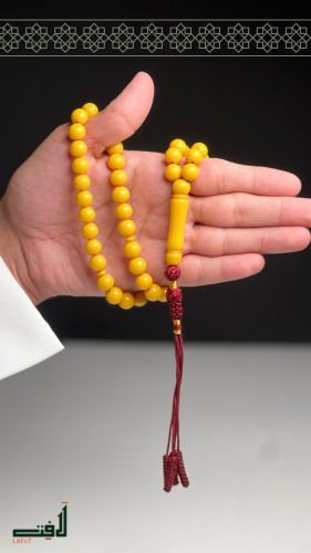 Yellow blazer with a decorative tassel