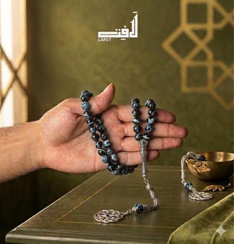 Blue matte prayer beads with a silver tassel