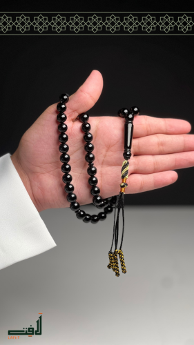 Black butterfly with a tassel detail