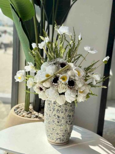 A luxurious vase and a delicate arrangement