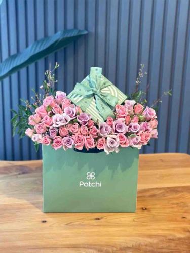 Arrangement of flowers with chocolate patches
