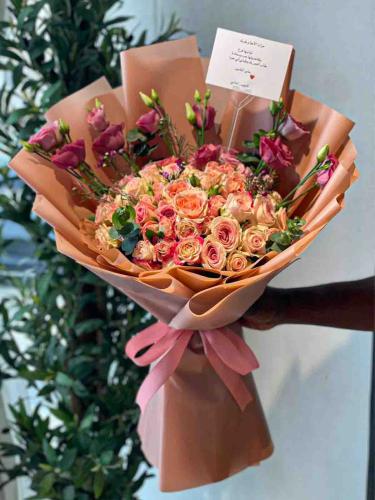 Pink hand bouquet of flowers