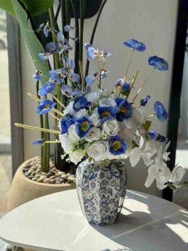 Elegant vase with artificial flowers
