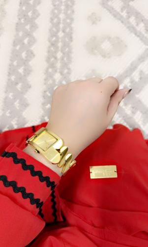 ساعه ماركه كوارتز بعقارب ذهبيه