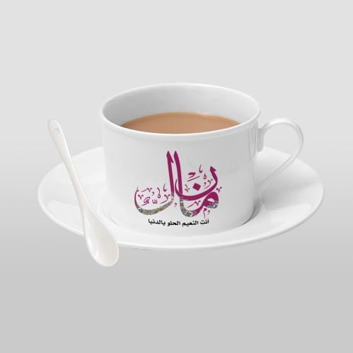 كوب مع صحن وملعقة