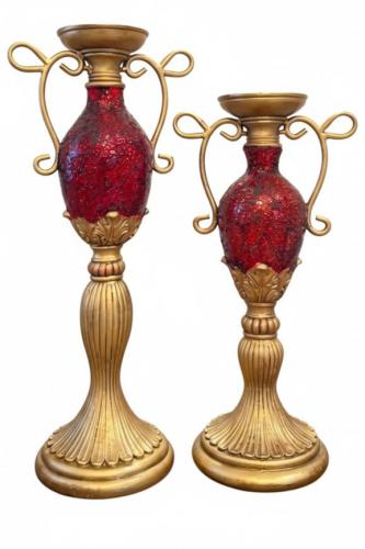 A pair of decorative candleholders – gold base and red mosaic sculpture