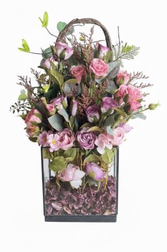 Luxury artificial flower bouquet inside a transpar...