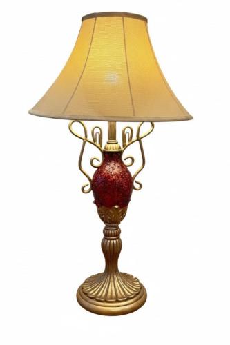 A bedside lamp in European style - a mixture of metal, resin, and mosaics