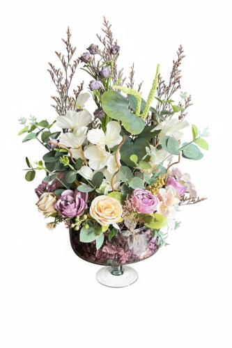 Luxury artificial flower bouquet inside a transpar...