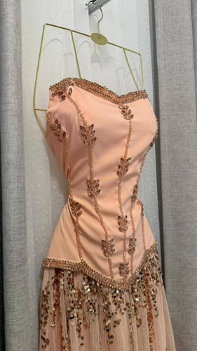 فستان سهرة مشمش ناعم