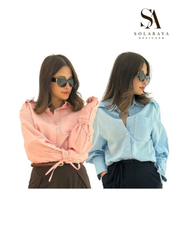 طقم نسائي أنيق مكون من قميص واسع وبنطال فضفاض