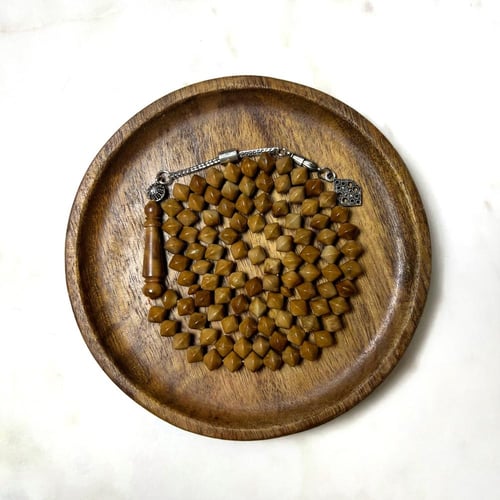 مسباح كوك بني