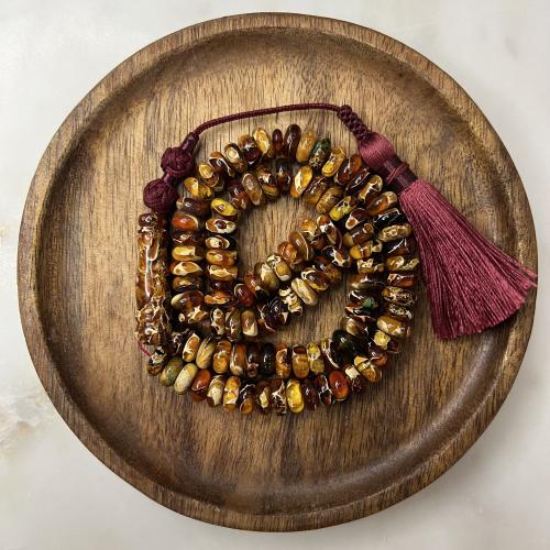 مسباح كهرمان بني