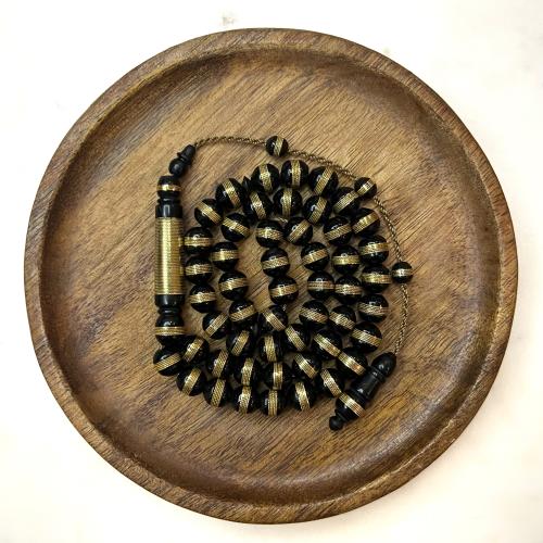 مسباح خشب الابانوس مجدول نحاس