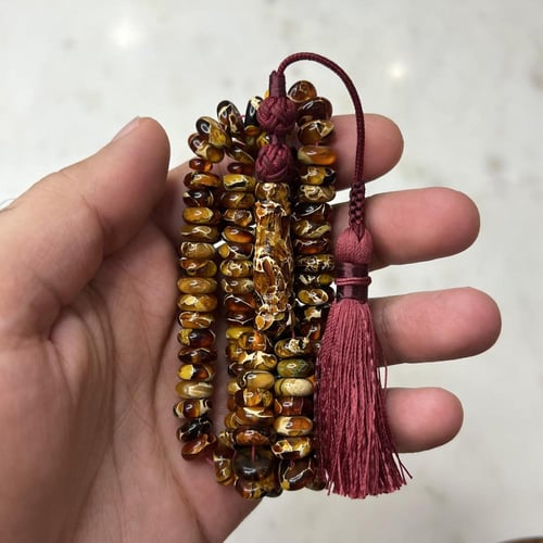 مسباح كهرمان بني