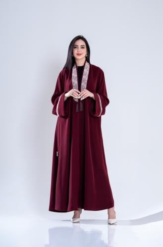 عبايه من قماش كريب السيراميك باللون العنابي بلمسه...