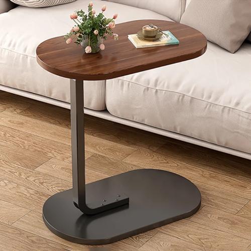 Side table in the shape of the letter C for the sofa
