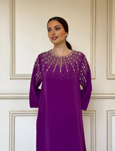 Royal purple dress with luxurious handwork of gold...