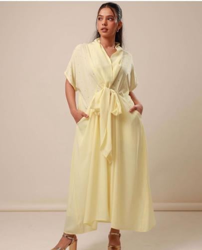 Light yellow dress with a fixed waist tie, decorated with Swarovski crystals on the chest